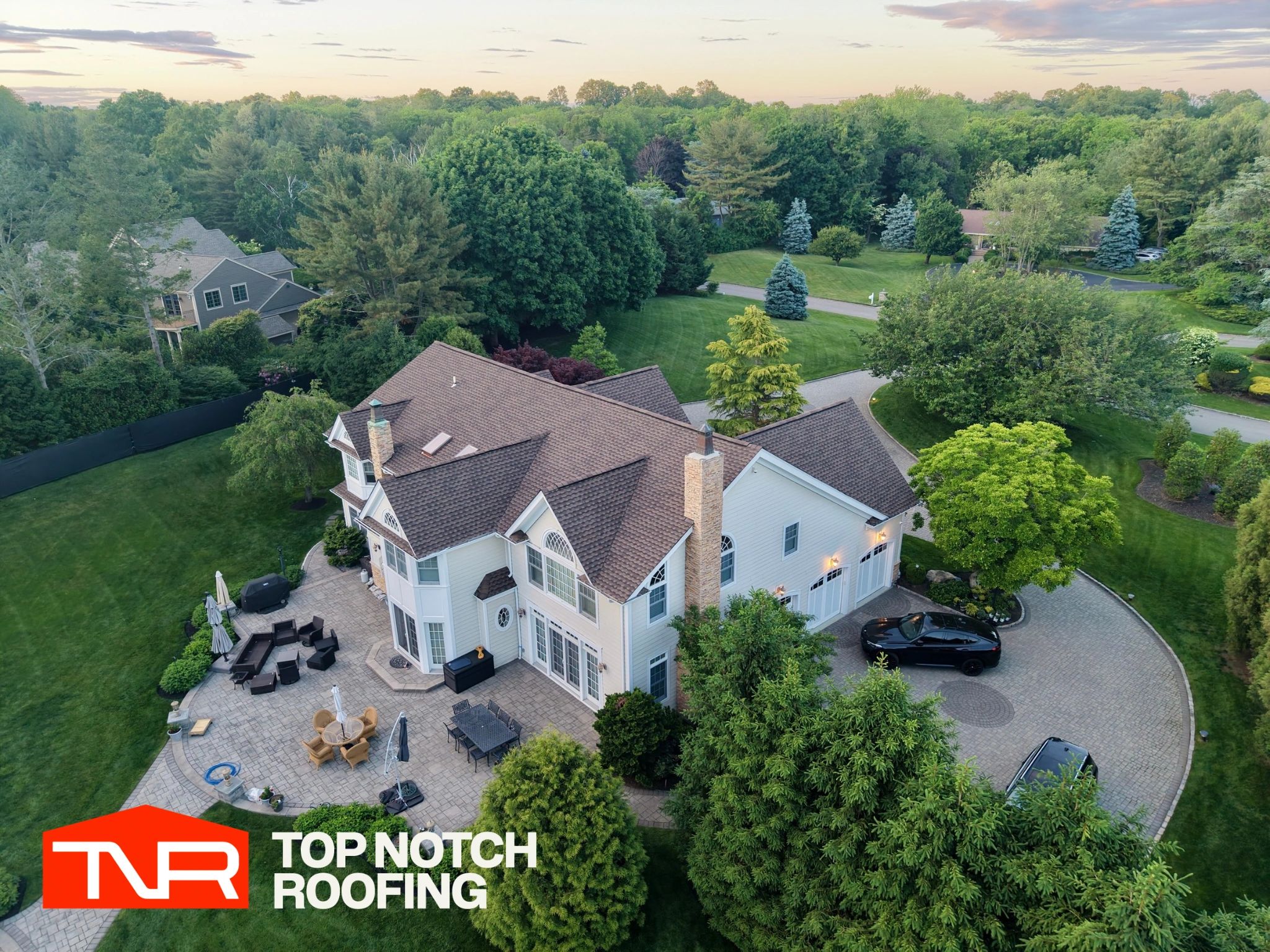 Top Notch Roofing crew completing a roof replacement in Seattle